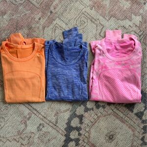 (3) Lululemon Swiftly Tech long sleeve shirts